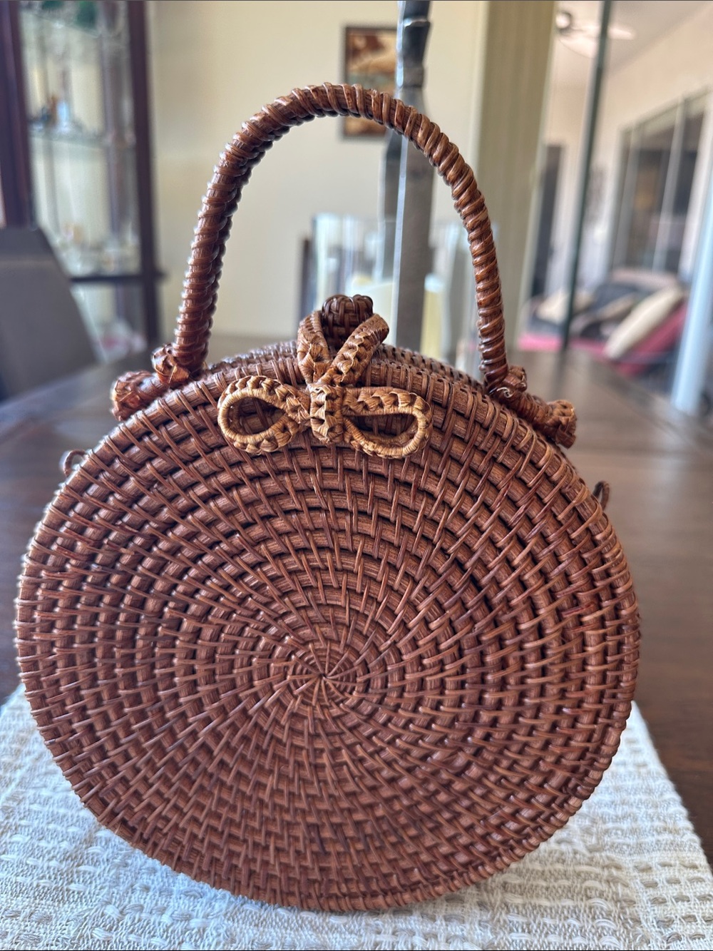 Handwoven Round Crossbody Bag in Brown with Bow Accent